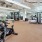 fitness center with large open spaces allowing room for workouts and for using equipment