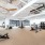 fitness center with large open spaces allowing room for workouts and for using equipment